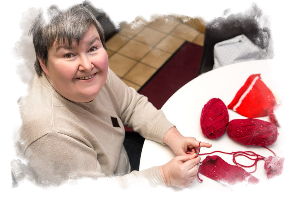 woman with disability doing craftwork